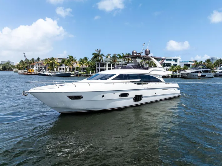Blue Abalone Yacht Photos Pics 2015 Ferretti Yachts 690 cruising on a sunny day near waterfront homes.