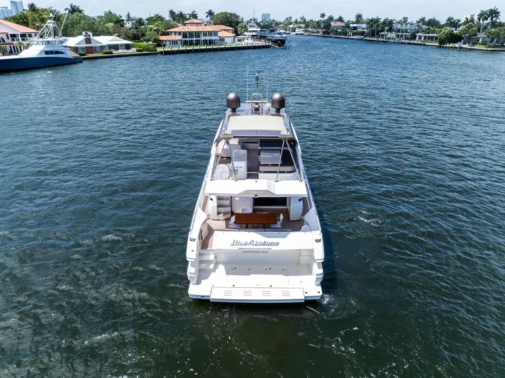 Blue Abalone Yacht Photos Pics 2015 Ferretti Yachts 690 cruising on a scenic waterway.