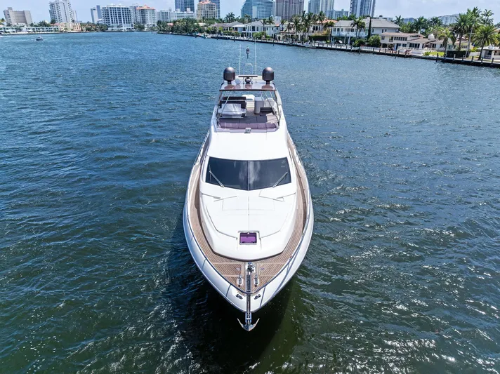 Blue Abalone Yacht Photos Pics Ferretti Yachts 690, 2015 model, cruising on a sunny waterfront with city skyline.