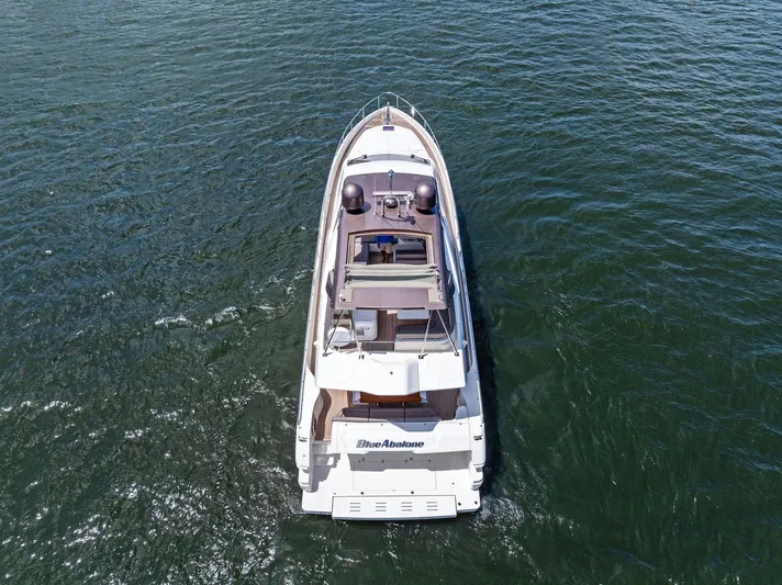 Blue Abalone Yacht Photos Pics Aerial view of 2015 Ferretti Yachts 690 cruising on open water.