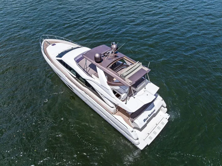 Blue Abalone Yacht Photos Pics 2015 Ferretti Yachts 690 cruising on open water, aerial view.
