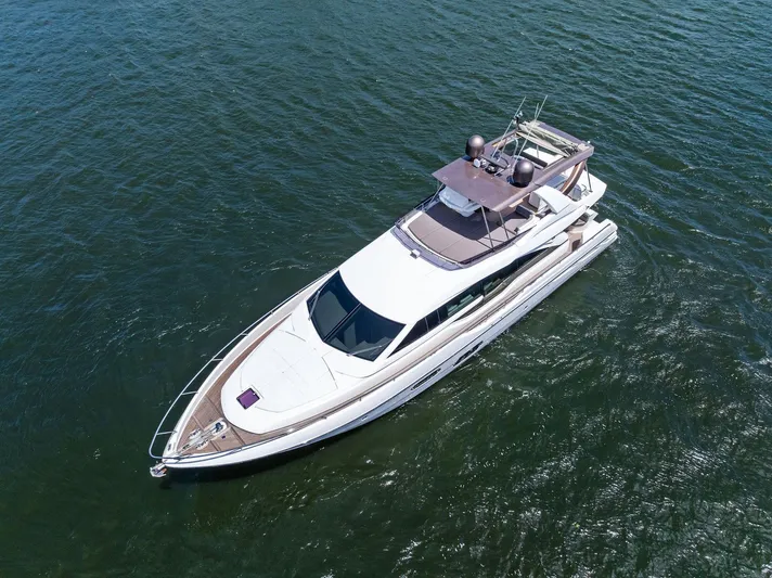 Blue Abalone Yacht Photos Pics 2015 Ferretti Yachts 690 cruising on open water, aerial view.