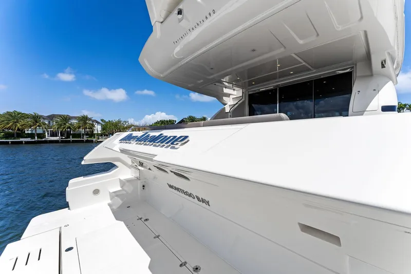 Blue Abalone Yacht Photos Pics 2015 Ferretti Yachts 690, sleek design, docked by waterfront, clear blue sky.