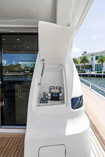 Blue Abalone Yacht Photos Pics 2015 Ferretti Yachts 690 control panel on deck, with waterfront view.