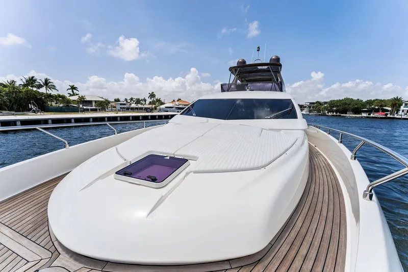 Blue Abalone Yacht Photos Pics 2015 Ferretti Yachts 690 on water, showcasing sleek design and luxurious deck.