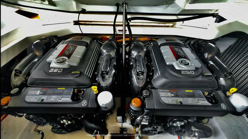  Yacht Photos Pics Twin engines in a 2022 Monterey 298SS boat, showcasing powerful marine engineering.