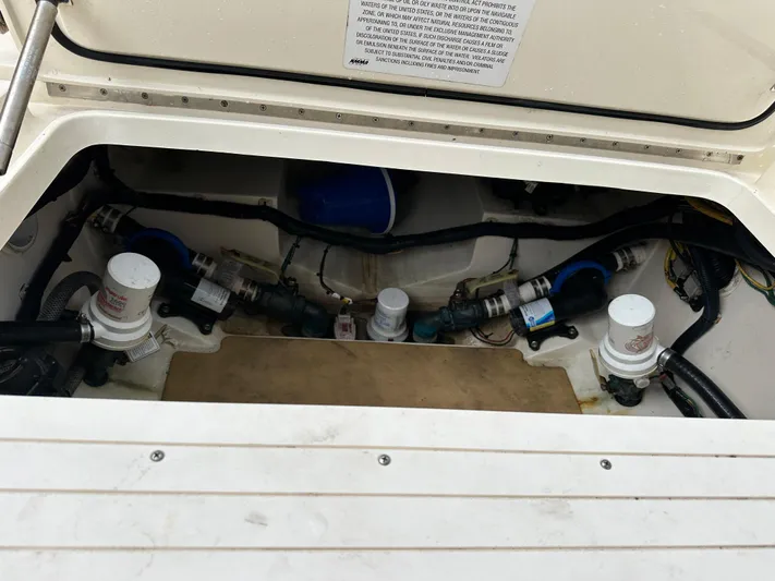  Yacht Photos Pics 2017 Scout 350 LXF boat engine compartment with visible components and wiring.