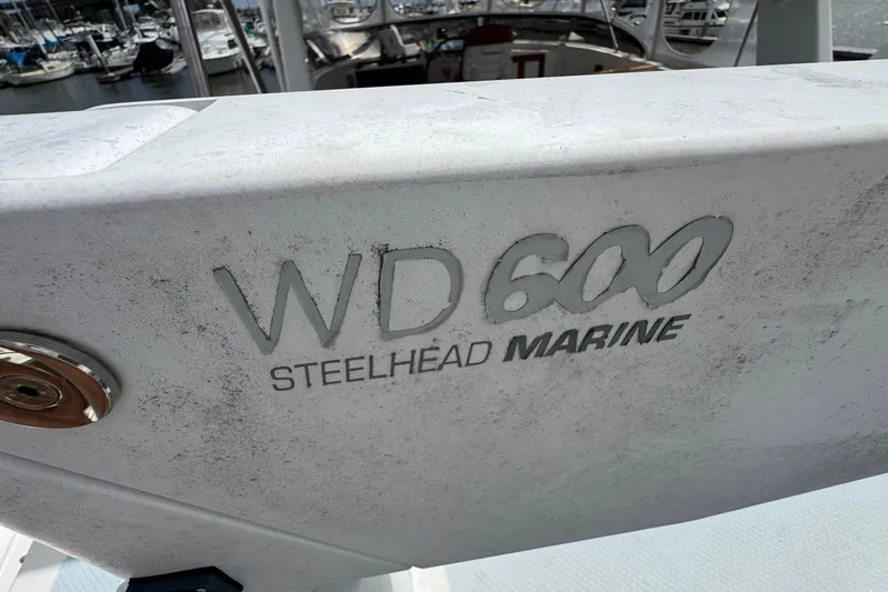 The Smithsunian Yacht Photos Pics Steelhead Marine WD600 on 1989 DeFever 49 CPMY yacht, docked at marina.