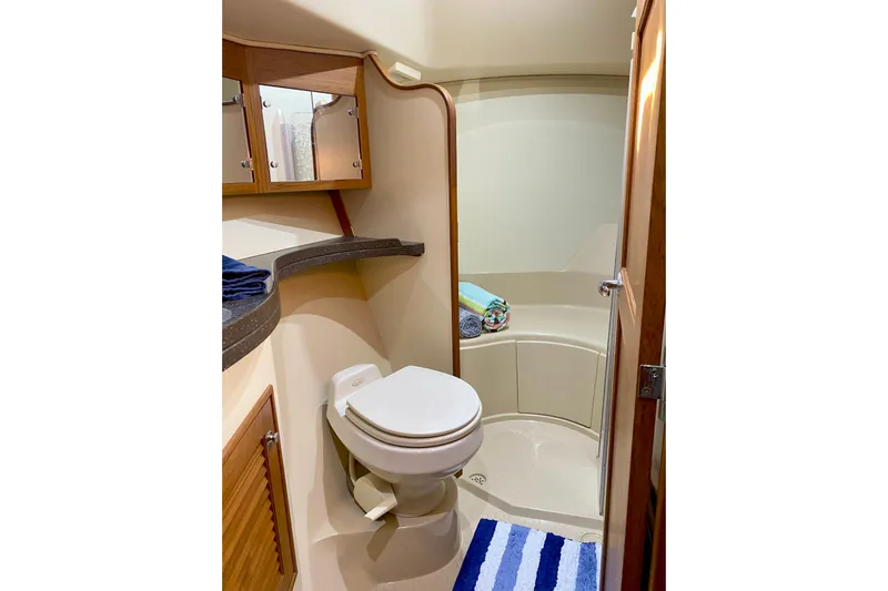 Second Wind Yacht Photos Pics Bathroom interior of 2006 Island Packet 440 yacht with toilet and shower area.