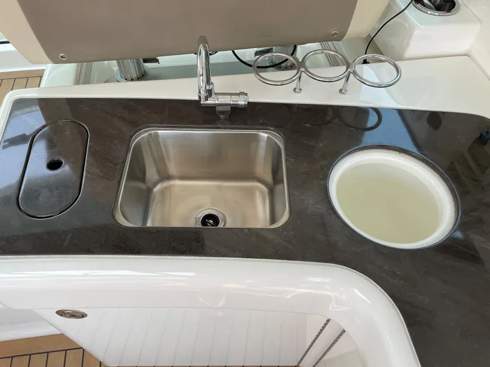  Yacht Photos Pics Luxury yacht kitchen sink area on 2013 Sea Ray 450 Sundancer.
