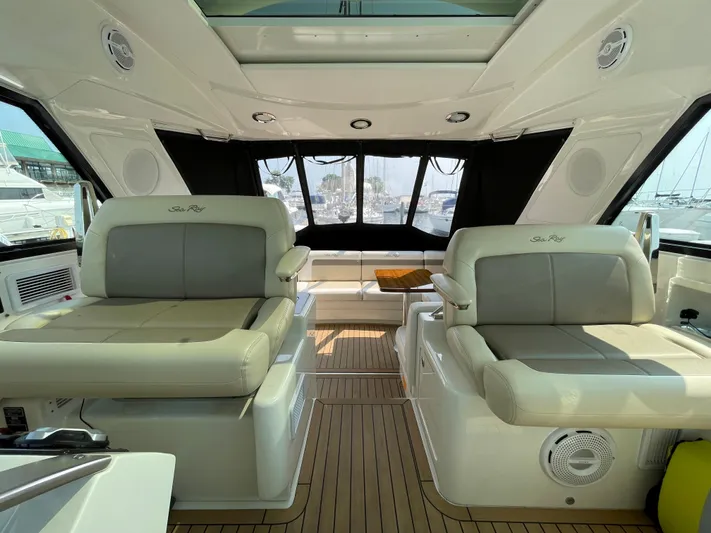  Yacht Photos Pics Interior of 2013 Sea Ray 450 Sundancer yacht with luxurious seating and wood flooring.