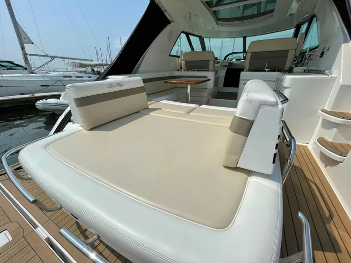  Yacht Photos Pics 2013 Sea Ray 450 Sundancer yacht with spacious deck and luxurious seating.