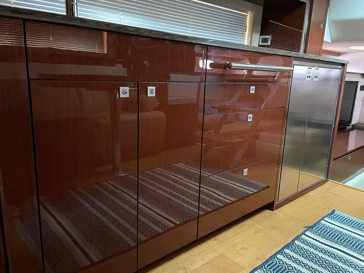  Yacht Photos Pics Luxurious kitchen cabinetry inside a 2013 Sea Ray 450 Sundancer yacht.