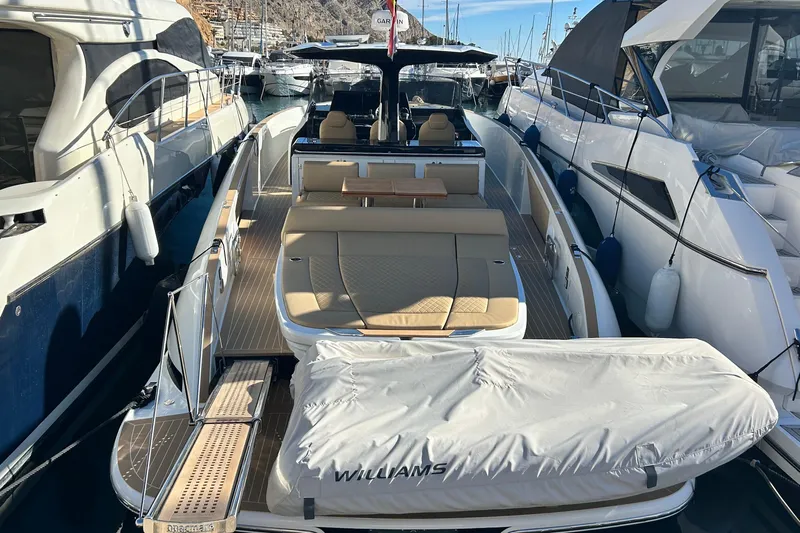  Yacht Photos Pics 2024 Solaris Power 44 Open yacht docked in a marina, showcasing luxury design.