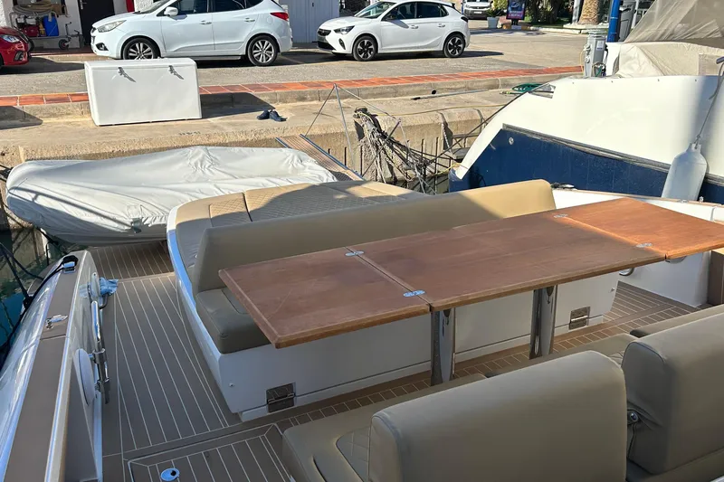  Yacht Photos Pics 2024 Solaris Power 44 Open yacht with spacious deck and seating area.