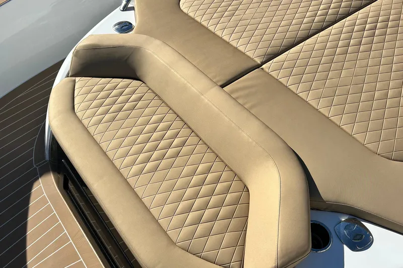  Yacht Photos Pics Luxurious tan seating on 2024 Solaris Power 44 Open yacht, featuring diamond stitching.