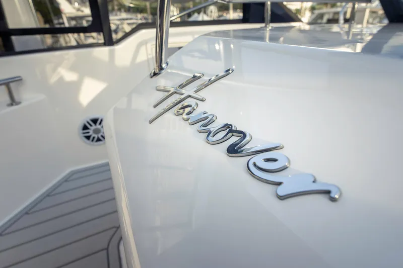 Yacht Photos Pics 2025 Hanover 387 boat with chrome logo on deck.