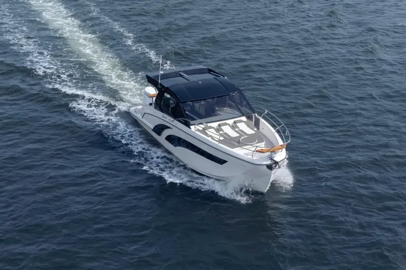  Yacht Photos Pics Luxury Hanover 387 yacht cruising on open water, 2025 model.