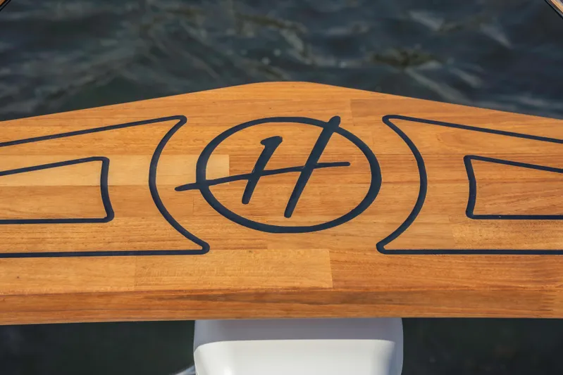  Yacht Photos Pics Wooden deck of Hanover 387 boat, featuring a stylish logo design, 2025 model.