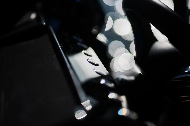  Yacht Photos Pics Close-up of Northman 1050 dashboard buttons, 2025 model, with blurred background lights.