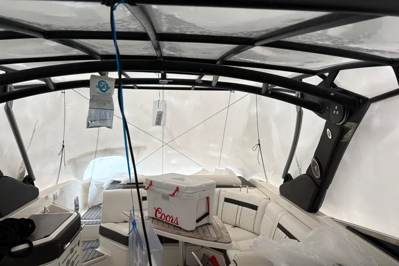 Gra Yacht Photos Pics 2018 Sea Ray SLX 310 boat interior with cooler and protective cover.