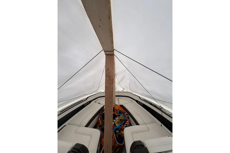 Gra Yacht Photos Pics 2018 Sea Ray SLX 310 boat interior under protective cover.