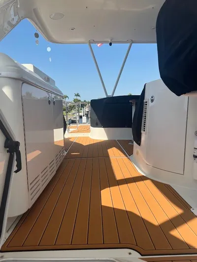 Roweboat Yacht Photos Pics 2006 Carver Voyager boat interior with teak flooring and modern design elements.