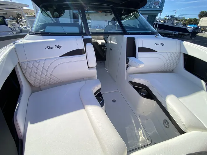 Double Trouble Yacht Photos Pics 2023 Sea Ray 260 SLX boat interior with white seating and modern design.