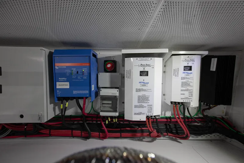 Mareluna Yacht Photos Pics Electrical system components inside a 2023 Vicem 55 yacht, featuring wiring and control panels.