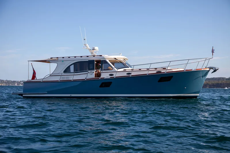 Mareluna Yacht Photos Pics 2023 Vicem 55 yacht on open water, showcasing sleek design and luxury features.