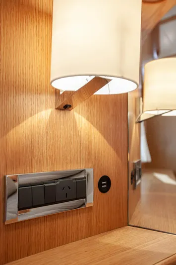 Mareluna Yacht Photos Pics Modern interior of 2023 Vicem 55 yacht with elegant lighting and power outlets.