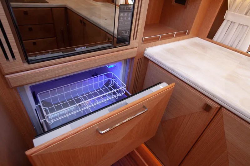 Mareluna Yacht Photos Pics Modern kitchen area in 2023 Vicem 55 yacht with open drawer refrigerator.