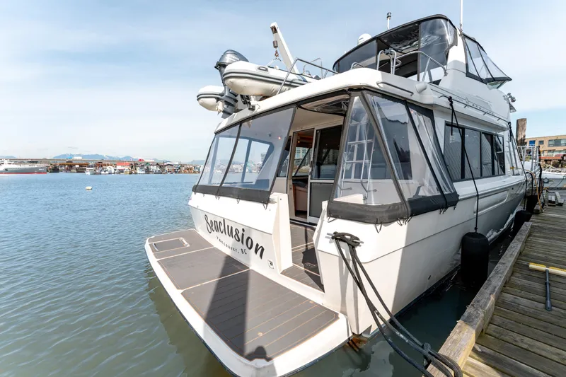 Seaclusion Yacht Photos Pics 1998 Bayliner 4788 Pilot House Motoryacht docked at marina, Vancouver, BC.