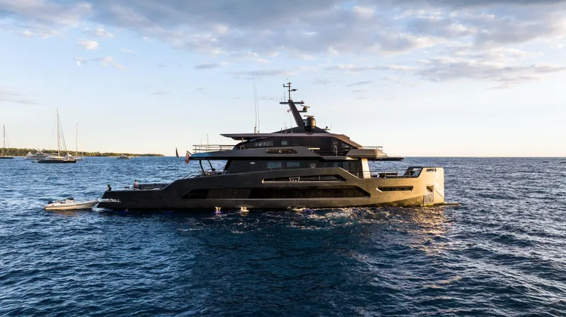 K+ Yacht Photos Pics Luxury Maori M 125 yacht cruising on the ocean at sunset, 2023 model.