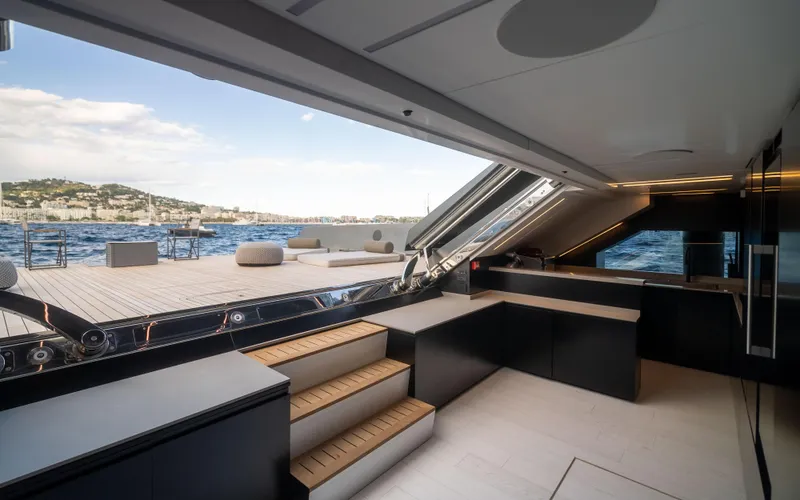 K+ Yacht Photos Pics Luxurious Maori M 125 yacht interior with ocean view, modern design, and outdoor seating, 2023 model.