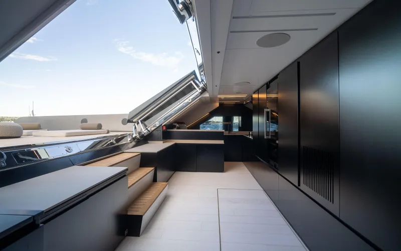K+ Yacht Photos Pics Luxurious interior of 2023 Maori M 125 yacht with sleek design and modern amenities.