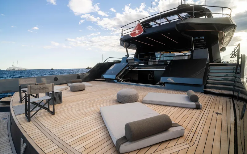 K+ Yacht Photos Pics Luxurious Maori M 125 yacht deck with modern seating, 2023 model, ocean view.