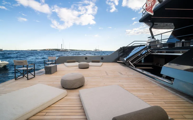 K+ Yacht Photos Pics Luxurious deck of 2023 Maori M 125 yacht with ocean view and seating.