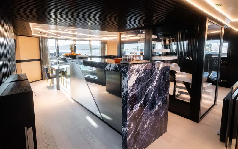 K+ Yacht Photos Pics Luxurious interior of 2023 Maori M 125 yacht with modern design and marble accents.