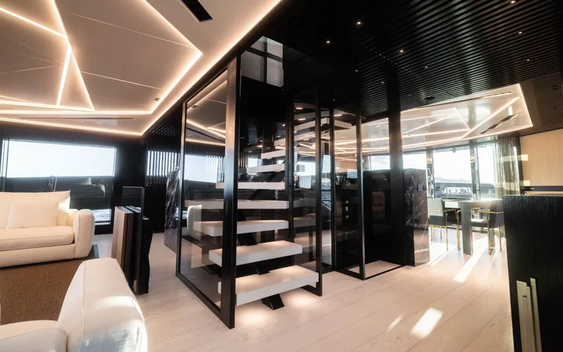 K+ Yacht Photos Pics Luxurious interior of 2023 Maori M 125 yacht with modern design and elegant lighting.