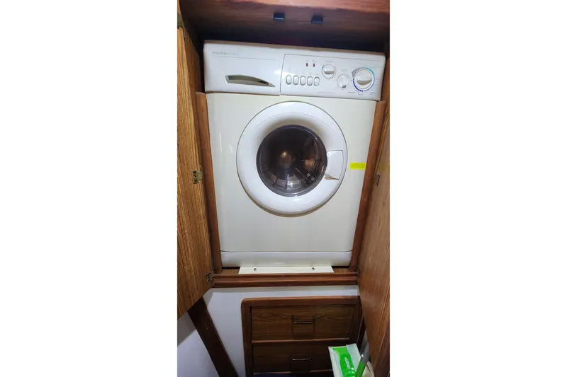 Tahawus Yacht Photos Pics Washing machine inside 2005 Endeavour 44 TrawlerCat wooden cabinet.