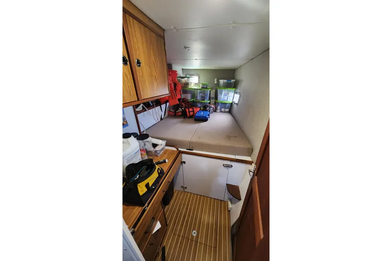 Tahawus Yacht Photos Pics Interior of 2005 Endeavour 44 TrawlerCat with storage and wooden cabinetry.