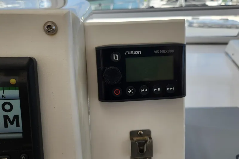 Tahawus Yacht Photos Pics Fusion MS-NRX300 marine stereo on 2005 Endeavour 44 TrawlerCat dashboard.