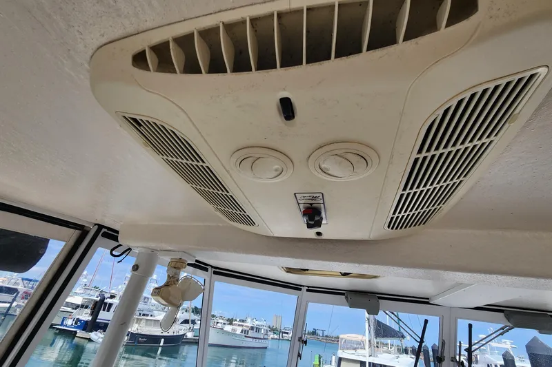 Tahawus Yacht Photos Pics Ceiling air vent inside 2005 Endeavour 44 TrawlerCat, with marina view in background.