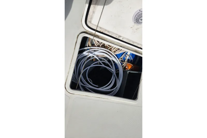 Tahawus Yacht Photos Pics Storage compartment on 2005 Endeavour 44 TrawlerCat with coiled ropes and equipment.
