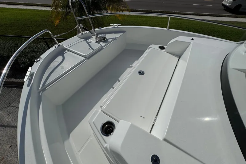  Yacht Photos Pics 2026 Jeanneau NC Sport 795 Series 2 boat deck, featuring sleek design and stainless steel railings.