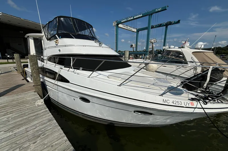  Yacht Photos Pics 2002 Carver 444 Cockpit Motor Yacht docked at North Shore Marina.