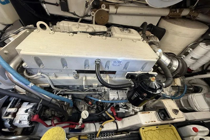 Grande Gator Yacht Photos Pics Engine compartment of a 2004 Tiara Yachts 4200 Open, showcasing detailed mechanical components.