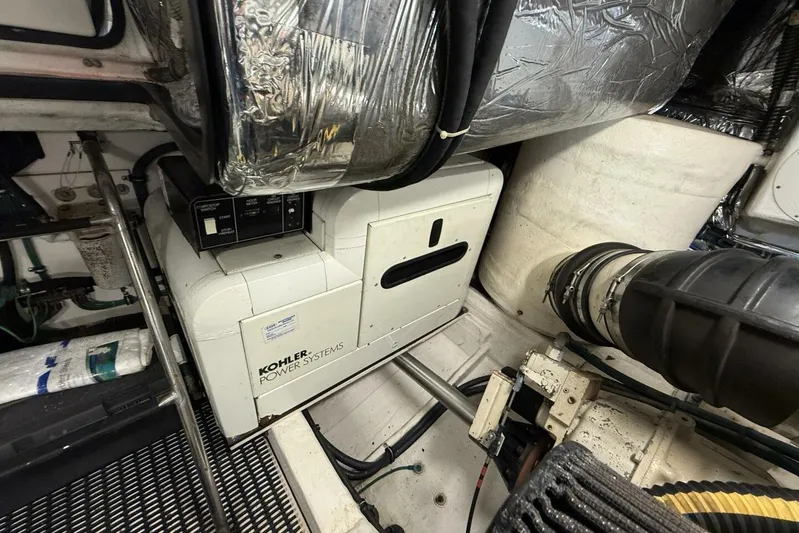 Grande Gator Yacht Photos Pics Engine room of 2004 Tiara Yachts 4200 Open with Kohler power system.