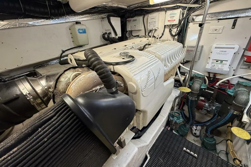 Grande Gator Yacht Photos Pics Engine room of 2004 Tiara Yachts 4200 Open, featuring Cummins marine engine.